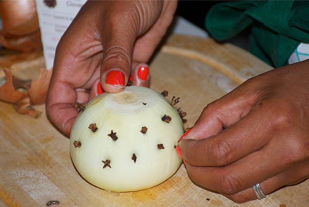 Soothing Natural Remedy for Respiratory Relief: Onion, Honey, Lemon, Ginger, and Clove Potion