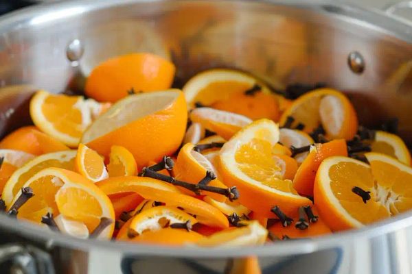 boiling orange peels with cloves